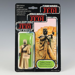 Star Wars by Palitoy, a Tusken Raider ( solid cheeks ) action figure on tri logo 70 back Return of the Jedi punched  card ROTJ 70B ( Hong Kong 1983  )