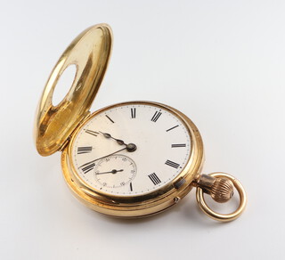 An 18ct yellow gold half hunter mechanical pocket watch with seconds at 6 o'clock contained in a 45mm case, the case marked 796, the movement inscribed Baumgant 6 Maddox Street London, Sheffield 1886 