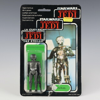 Star Wars by Palitoy, a Zuckuss action figure on tri logo 70 back Return of the Jedi punched  card ROTJ 70B ( Hong Kong 1983  )