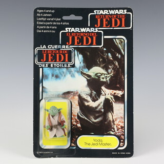 Star Wars by Palitoy, a Yoda ( brown snake ) action figure on tri logo 70 back Return of the Jedi punched  card ROTJ 70B ( Hong Kong 1983  )