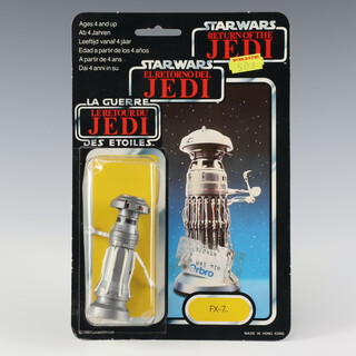 Star Wars by Palitoy, a FX-7 action figure on tri-logo 70 back Return of the Jedi punched  card ROTJ 70B ( Hong Kong 1983  )