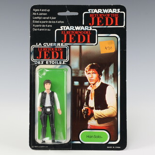 Star Wars by Palitoy, a Han Solo ( big head ) action figure on tri logo 70 back Return of the Jedi punched  card ROTJ 70B ( China 1983  )