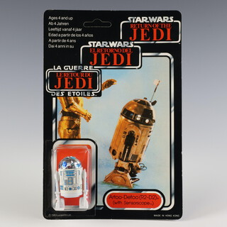 Star Wars by Palitoy, an Artoo-Detoo ( R2-D2 ) ( with Sensorscope ) action figure on tri logo 70 back Return of the Jedi unpunched card ROTJ 70B ( Hong Kong 1983  )