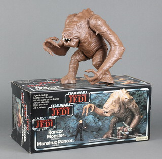 Star Wars, a Rancor Monster figure with tri logo box, original cardboard inserts and poster 