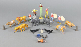 Circus figures by Charbens, Britains etc including 2 stilt walkers, 2 clowns, 1 unicyclist, 2 elephants, 3 seals, 1 penguin, 3 horses, lion, tiger, ballerina and a Britain proprietor 