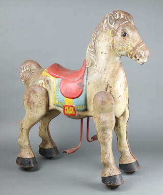 A Mobo pressed metal walk along horse 77cm h x 70cm w x 22cm d 