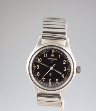 A gentleman's steel cased Hamilton Military issue black dial wristwatch, the reverse numbered 6B/9101000 H3180M contained in a 35mm case on a later expanding bracelet 