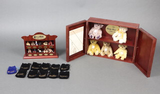 Steiff, a collection of 11 miniature metal figures of teddy bears 5cm with plush cases and wall mounting display stand together with a limited edition  Steiff UK bear set 1999 - 2003 no.216 of 1847 with certificate and display stand 