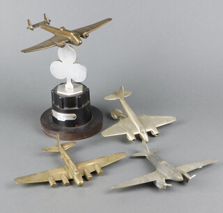 A brass model of a Hampden bomber 1939, raised on a socle base, 24cm, a brass model of a 4 engined aircraft 23cm, a chrome model of a twin engined jet aircraft 20cm and an aluminium model of a twin engined aircraft 24cm 