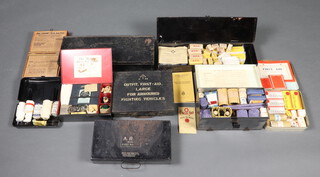 An ambulance set first aid kit contained in a black metal box with hinged lid and contents, an ARP first aid kit with contents, a Regalo first aid kit and contents, an empty Armoured Fighting vehicles first aid tin and other empty first aid tins