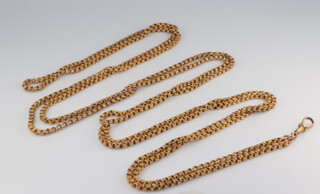 A yellow metal muff chain 150cm