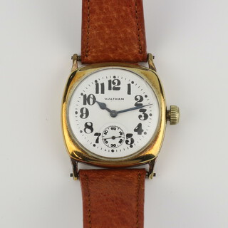 A gentleman's vintage gilt cased Waltham wristwatch with seconds at 6 o'clock, having a repainted dial, contained in a 30mm case 