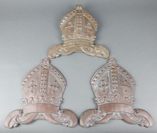 Three 19th/20th Century bronze wall/insurance plaques in the form of Bishops mitres, 1 with motto, 29cm h x 27cm  