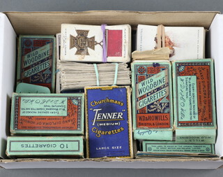 A collection of cigarette cards including Players, Wills etc