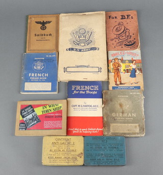 A Second World War American Army stationery set, 2 American Army phrase books - German and French, a British/French phrase book etc 