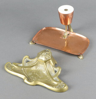 An Art Nouveau copper and brass inkwell, the base with pen tray and associated ceramic inkwell 12cm x 17cm x 9cm, an Art Nouveau style cast brass inkwell with associated glass inkwell (f) 