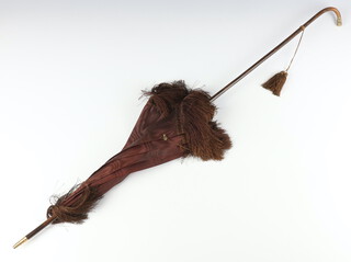 A lady's Victorian parasol with brown silk canopy (some tears)  