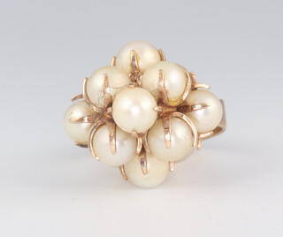 A 9ct yellow gold cultured pearl dress ring, 6.6 grams, size J 