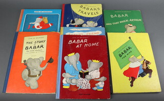 Brunhoff Jean de, a collection of 7 1930/40's Babar books to include  "The Story of Babar" 1934, "Babar The King" 1936, "Babar's Friend Zephir" 1937, "Babar at Home" 1938, "Babar and That Rascal Arthur" 1948, "Babar's Travels" 1935, "Babar and Father Christmas" 1940