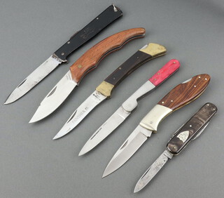 Aug Muller a 2 bladed folding pocket knife with nail file and polished stag horn grip 8cm, Panther JR a Japanese folding pocket knife with 7cm blade and polished grip, Mercator a folding pocket knife the grip marked K55K 11cm, MMEN folding pocket knife with polished wooden grip 7cm and 2 unmarked folding pocket knives 