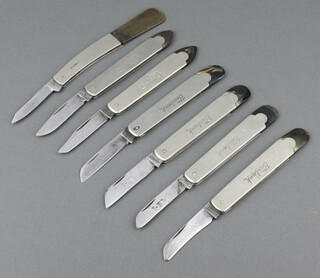 Four folding "budding" type knives the blades marked I.X.L George  The Burbank, together with  2  marked The Curtis and 1 other the body marked Premier, all with horn butts 