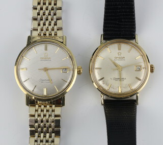 A gentleman's gilt cased Omega Seamaster De Ville automatic calendar wristwatch 35mm, a ditto 35mm 