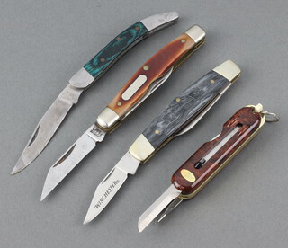 Winchester a twin handled pocket knife the blade marked 2005 with polished horn grip 7cm, Schrade New York a twin bladed pocket knife blade marked 330T with grip marked Old Timer, Gerber Fiskars a multi tool pocket knife and 1 other with unmarked blade and green veined grip  