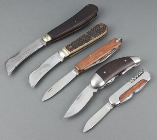 A Wright & Sons a pruning knife with wooden grip (blade is worn and loose), Robinson a pruning knife with stag horn grip (blade has contact marks and has been sharpened), Laguiole a multi bladed pocket knife with polished horn grip, Inox a multi bladed folding knife with wooden grip and 1 other unmarked 