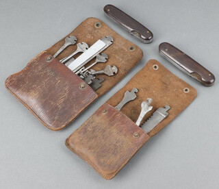 A Bonsa German First World War multi pocket tool kit with 10 attachments and leather pouch, the reverse marked Bonsa DRGM,Â DeutschesÂ Reich Gebrauchsmuster,Â together with 1 other with 4 attachments