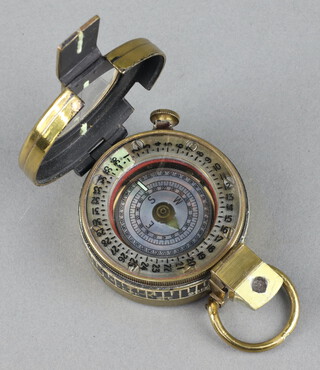 A brass military style prismatic compass 