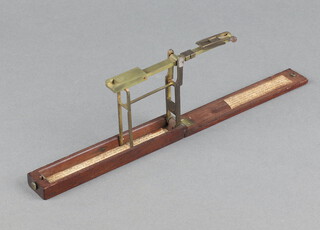 A Wilkinson Ormskirk 18th Century brass sovereign scales contained in a mahogany folding case (no weights) 