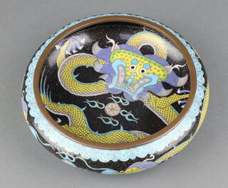 A Japanese black and blue ground cloisonne enamelled bowl decorated a dragon 19cm 