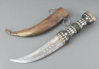 An Eastern Jambiya dagger  with 14cm engraved blade and mother of pearl inlaid grip 