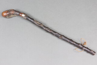 An Edwardian shillelagh with white metal plaque marked GW to RJ May 1904 68cm 