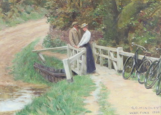 G C Hindley, oil on board, figures on a bridge, "A Good Appointment" inscribed War Fund 1900 24cm x 34cm, labels on verso 