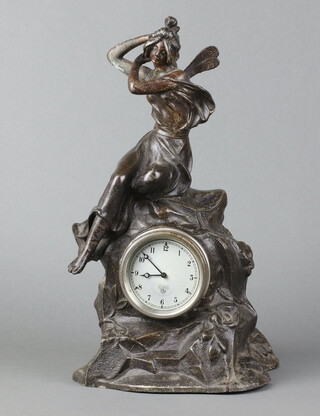A Smiths 8 day car clock with 8cm silvered dial, Roman numerals, marked 277.135, contained in a spelter case in the form of a seated Tatania 38cm h x 21cm w x 16cm d 