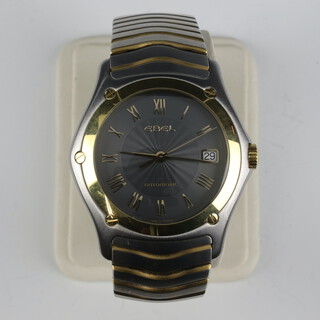 A gentleman's steel cased Ebel automatic calendar wristwatch on a bi-metallic bracelet with a 750 bezel, the case numbered 58611473, contained in a 35mm case with original box 