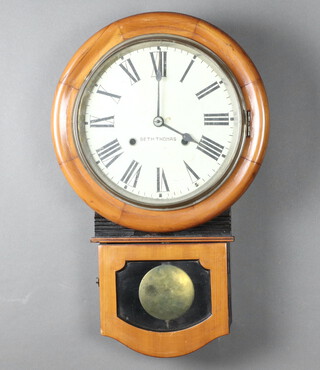 Seth Thomas, an American 19th Century drop dial wall clock with 26cm painted dial, Roman numerals, contained in a mahogany case, complete with pendulum (no key) 