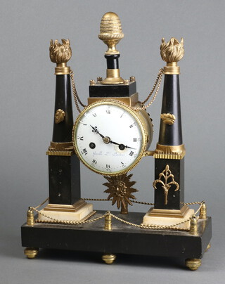 A French Empire striking mantel clock, with silk suspension movement, contained in a gilt metal and black marble case supported by 2 columns, the porcelain dial marked Gavelle LNE London, complete with pendulum and key 