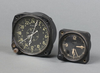 An Elgin 8 day aircraft timepiece with 5cm black dial contained a black Bakelite case together with a Waltham Watch Co. aircraft timepiece with 7cm dial marked 8 Day Civil Date, the reverse marked Contract no. 84106 F.S.S.C 8-C-590 part no. CDIA (both currently running) 