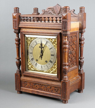 Winterhalder and Hofmeire, a Victorian Ting Tang 8 day striking bracket clock with 22cm gilt dial, silvered chapter ring, Roman numerals, contained in an oak case with back plated marked D.R. Patent W&H SCH, complete with pendulum (f) and key,  50cm h x 36cm w x 23cm d  