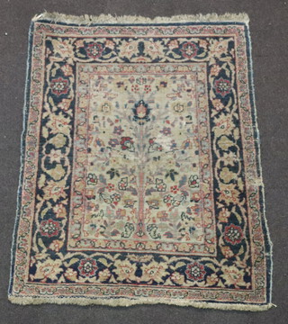 A white, blue and pink ground rug with rectangular floral panel to the centre 98cm x 80cm 