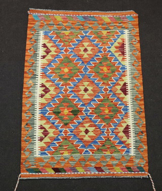 A yellow, blue and white Chobi Kilim with diamond design 123cm x 80cm 