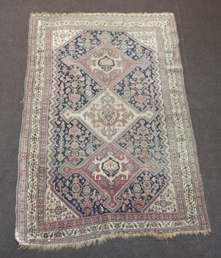 A pink, blue and white ground Persian rug with 3 diamond shaped medallions to the centre 200cm x 132cm 