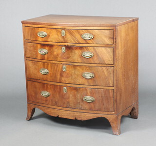 A 19th Century bleached mahogany bow front chest of 4 long graduated drawers with brass oval plate drop handles and escutcheons, raised on bracket feet 86cm h x 85cm w x 48cm d 