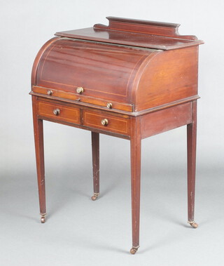 An Edwardian inlaid mahogany cylinder bureau with raised back and well fitted interior above 2 drawers, raised on square tapered supports, spade feet 103cm h x 75cm w x 48cm d 