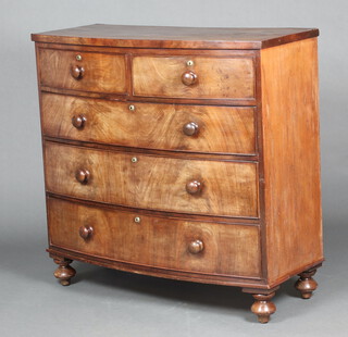 A Victorian mahogany bow front chest of 2 short and 3 long drawers raised on bun feet 106cm h x 107cm w x 48cm d 
