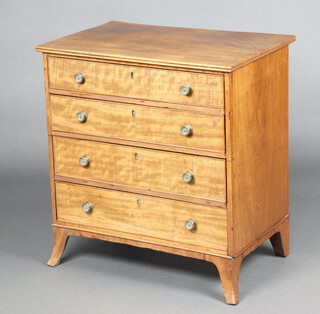 A 19th Century bleached mahogany chest of 4 long graduated drawers with brass handles, raised on splayed bracket feet 74cm h x 69cm w x 44cm d  