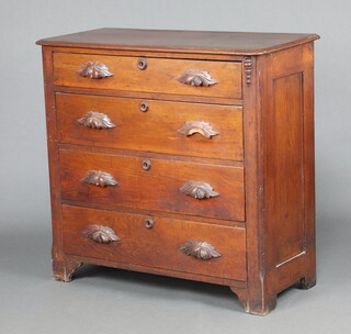 A 19th Century Continental carved walnut chest of 4 long drawers with carved handles, raised on square supports 99cm h x 103cm w x 48cm d 