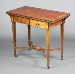 An Edwardian rectangular inlaid mahogany card table the base fitted 2 drawers, raised on square tapered supports with X framed stretcher 75cm h x 86cm w x 46cm d 